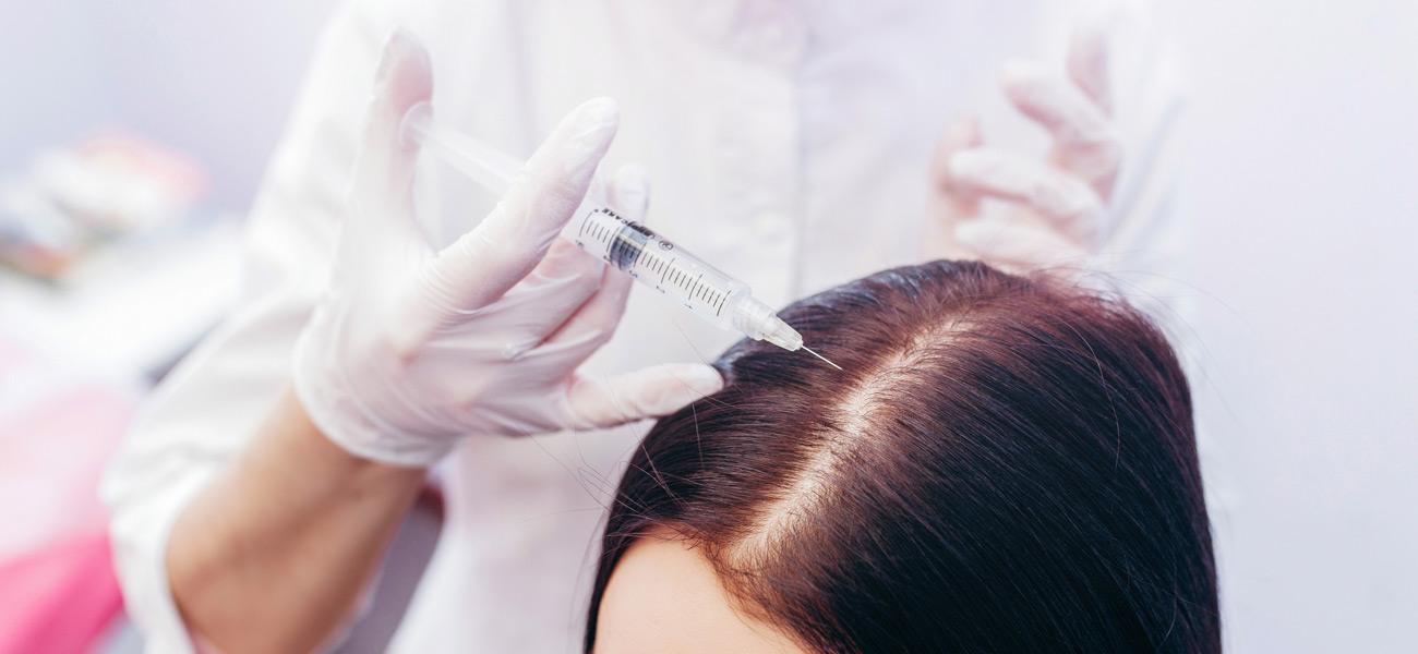 Woman-undergoing-PRP-Hair-Restoration-treatment